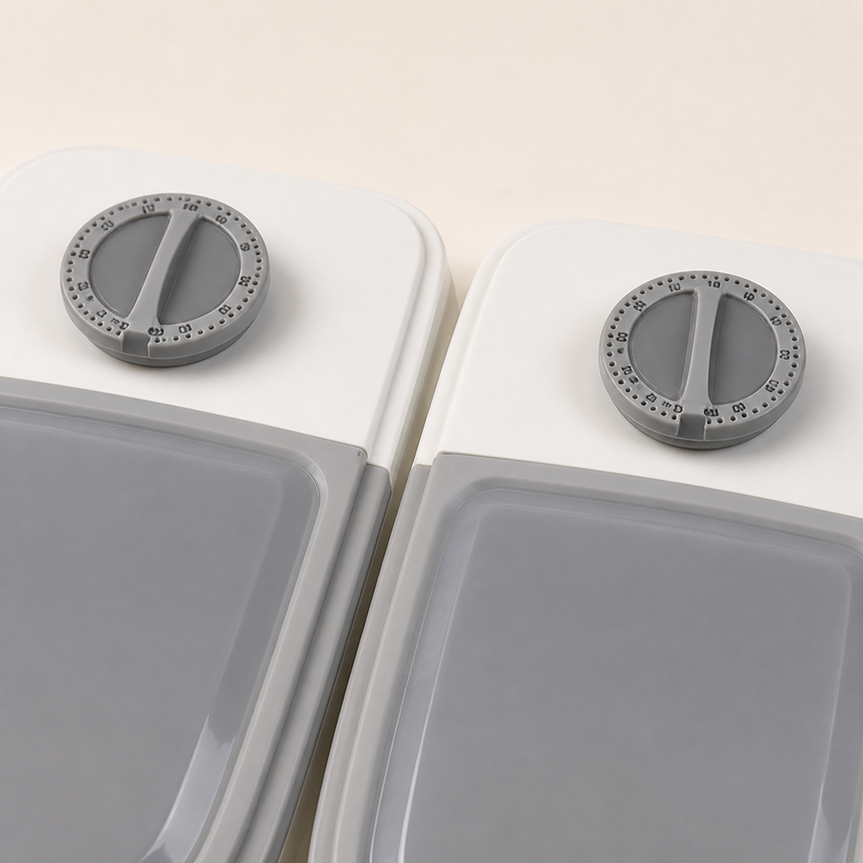 Two independent circular mechanical timer dials