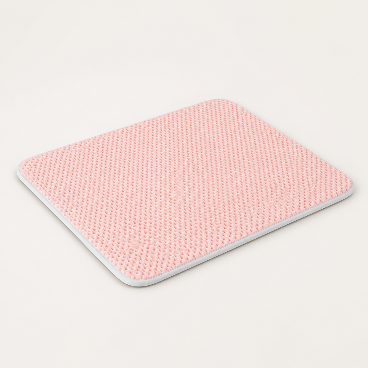 Pink breathable dog cooling mat on a clean neutral background