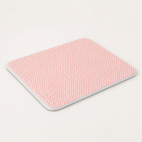 Pink breathable dog cooling mat on a clean neutral background