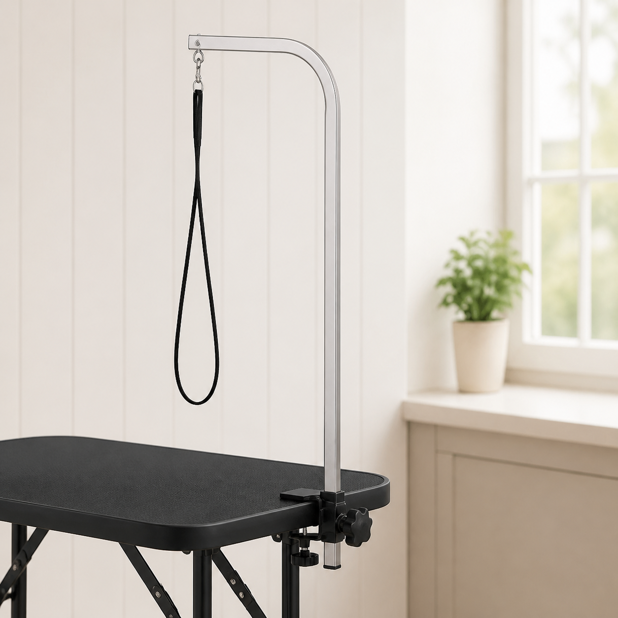 Adjustable grooming arm and safety loop